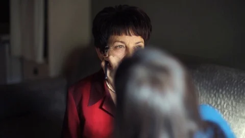 Professional make-up. Makeup artist doing makeup for an elderly woman Stock Footage 106378618