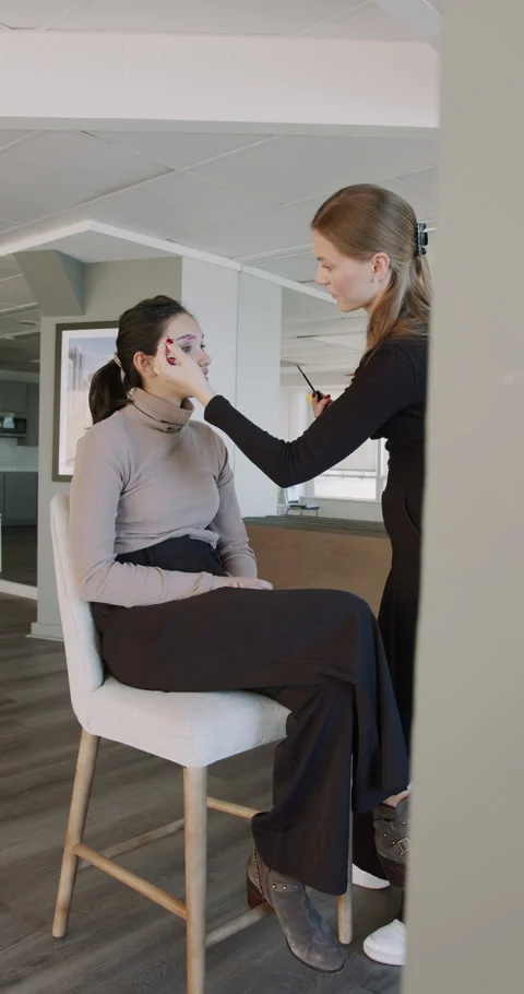 Professional makeup application in modern workspace, Caucasian artist carefully Video stock 321037785