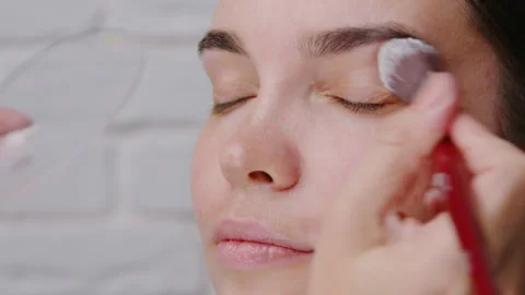 The Professional Makeup Application Process in a Studio Setting is quite 動画素材 327622872