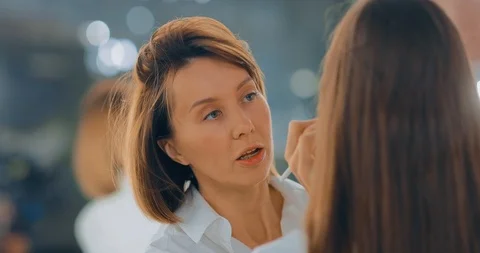 Professional makeup artist does makeup in a beauty salon. Workplace with a large Stock Footage 119236652