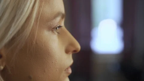 Professional makeup artist making eye-makeup for young model Video stock 101023202