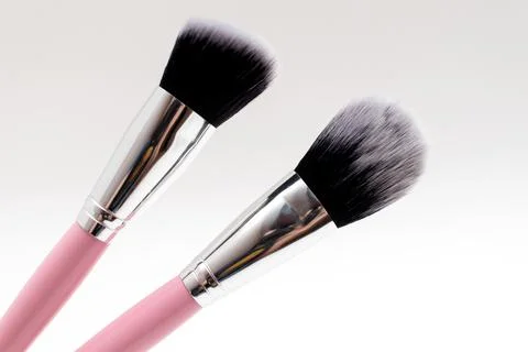 Professional makeup brushes on white background Stock Photos