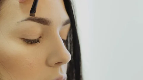 Professional makeup mascara application with brush - work in beauty fashion Stock Footage 73846390