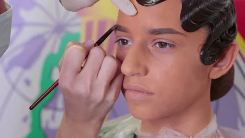 Professional makeup in process. close up Stock Footage 164930969