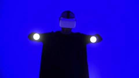 Professional male coder wearing augmented reality glasses makes gestures Stock Footage 159078072