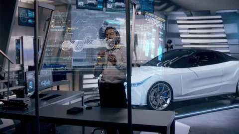 Professional Male Engineer interacts with White Hologram Car concept Video stock 120868561