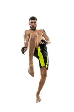 Professional male MMA boxer in action and motion isolated on white studio Stock Photos