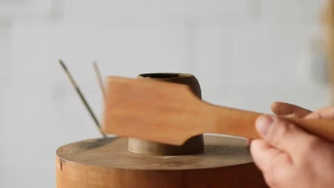 Professional male potter working in workshop, studio - making a clay teapot. Stock Footage 145534422