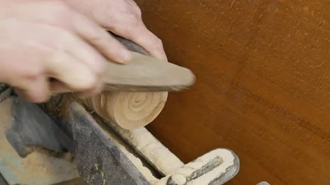 Professional man carpenter is sharpening a chisel Stock Footage 150354411