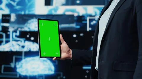 Professional man ensures artificial intelligence algorithms with mockup screen Foto stock