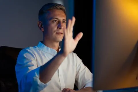 Professional Man Interacting With Virtual Screen in Modern Office Stock Photos