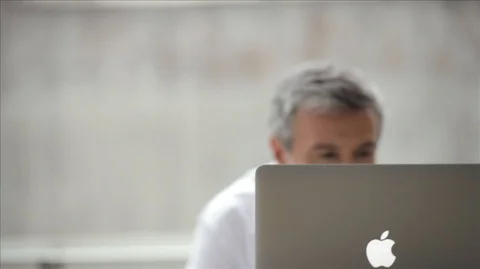 Professional man seriously working on his laptop. Stock-Footage 88342994