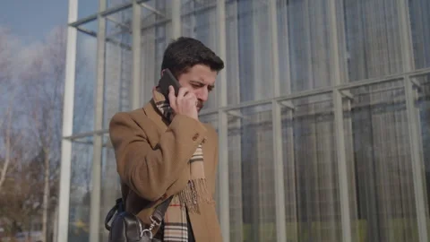 Professional Man Talks On Cellphone Stock Footage 270335642