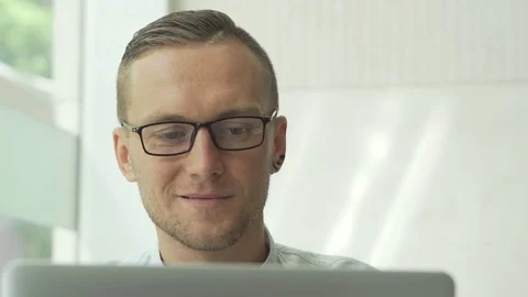 Professional man working on laptop computer Stock Footage 79104878