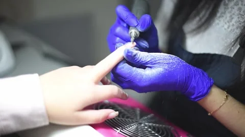 Professional manicure master files nails , preparation for polishing Stock Footage 248765788