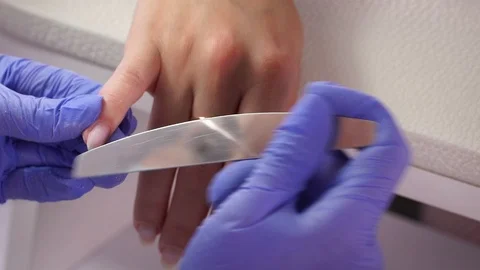 Professional manicure nail file shape left hand Video stock 103830653