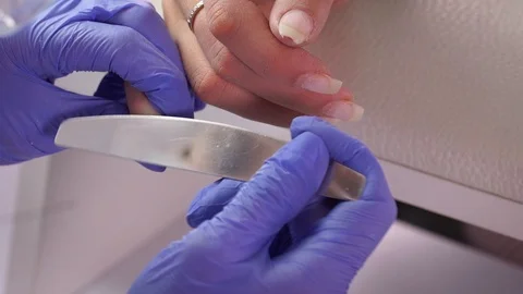 Professional manicure nail file shape straight nail Stock Footage 103830689
