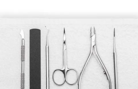 Professional manicure tools on a white background. Stock Photos