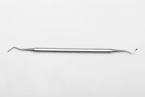 Professional manicure tools on a white background. Cuticle pusher Stock Photos