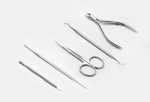 Professional manicure tools on a white background. Stock Photos