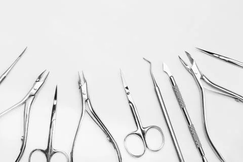 Professional manicure tools on a white background. Stock Photos