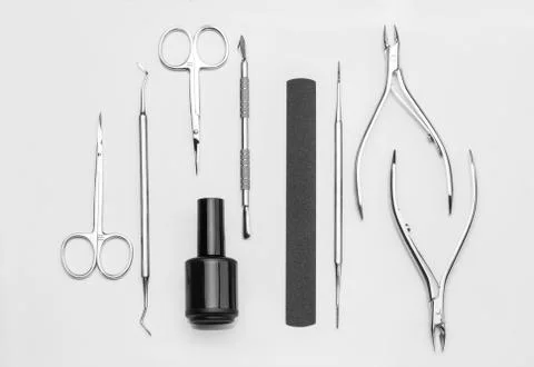 Professional manicure tools on a white background. Stock Photos