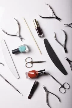 Professional manicure tools on a white background. Stock Photos
