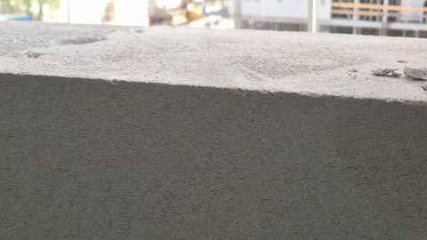 Professional Mason Installing Aerated Concrete Block with Level Stock-Footage 334334893