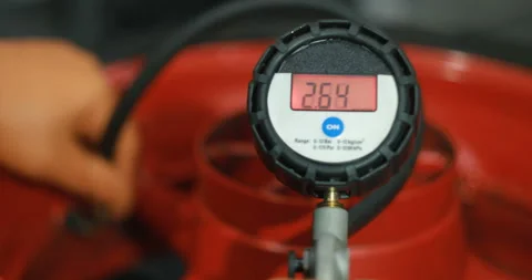 A Professional Mechanic In The Workshop Pumps The Wheel Stock Footage 125921891
