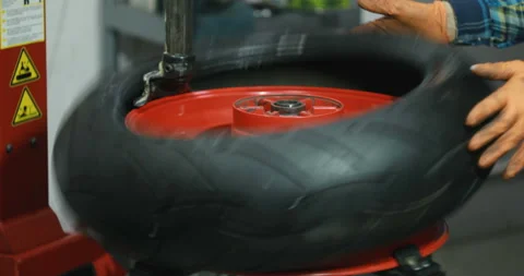 A Professional Mechanic In The Workshop Serviced The Wheels Of The Transport Hub Stock Footage 125921916