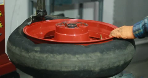 A Professional Mechanic In The Workshop Serviced The Wheels Of The Transport Hub Stock Footage 125921966