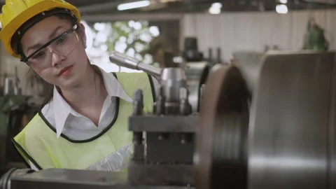 Professional mechanical engineer or operation woman wear uniform goggles safety Stock Footage 150476075