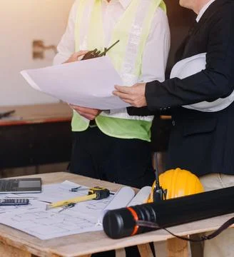Professional Mechanical Engineer team Working on Personal Computer at Metal.. Stock Photos
