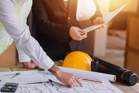 Professional Mechanical Engineer team Working on Personal Computer at Metal.. Stock Photos