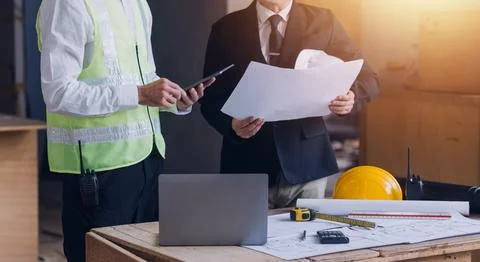 Professional Mechanical Engineer team Working on Personal Computer at Metal.. Stock Photos