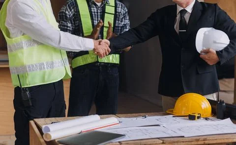 Professional Mechanical Engineer team Working on Personal Computer at Metal.. Stock Photos