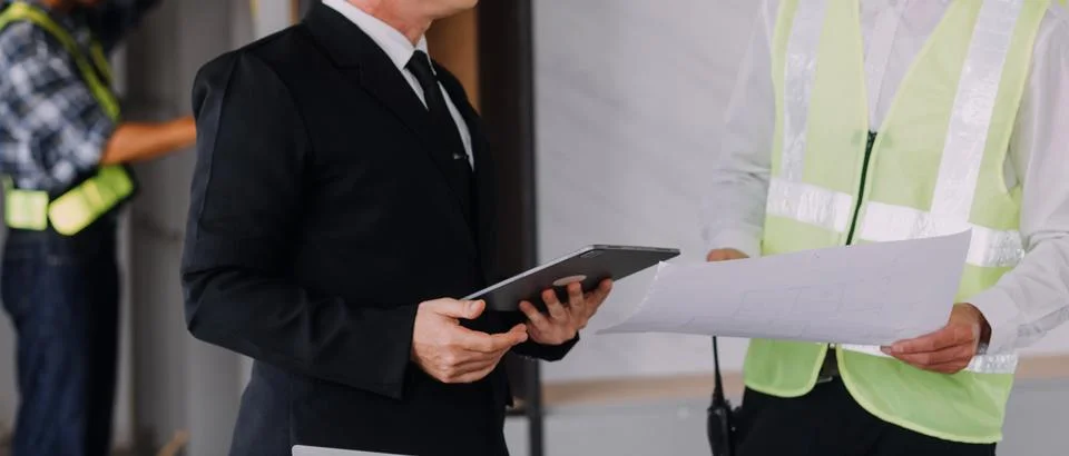 Professional Mechanical Engineer team Working on Personal Computer at Metal.. Stock Photos