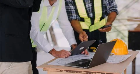 Professional Mechanical Engineer team Working on Personal Computer at Metal.. Stock Photos