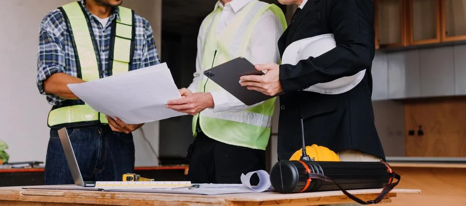 Professional Mechanical Engineer team Working on Personal Computer at Metal.. Stock Photos