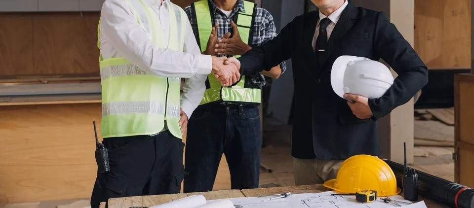 Professional Mechanical Engineer team Working on Personal Computer at Metal.. Stock Photos