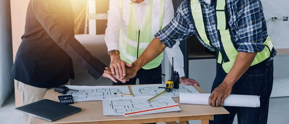 Professional Mechanical Engineer team Working on Personal Computer at Metal.. Stock Photos