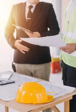 Professional Mechanical Engineer team Working on Personal Computer at Metal.. Stock Photos