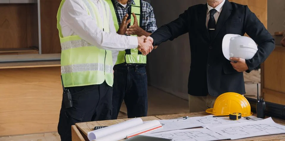Professional Mechanical Engineer team Working on Personal Computer at Metal.. Stock Photos