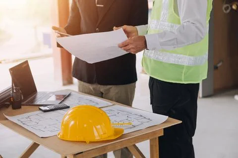 Professional Mechanical Engineer team Working on Personal Computer at Metal.. Stock Photos