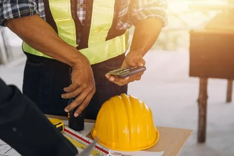 Professional Mechanical Engineer team Working on Personal Computer at Metal.. Stock Photos