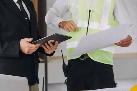 Professional Mechanical Engineer team Working on Personal Computer at Metal.. Stock Photos