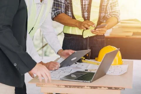 Professional Mechanical Engineer team Working on Personal Computer at Metal.. Stock Photos