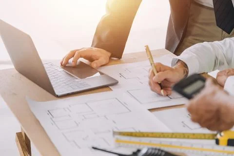 Professional Mechanical Engineer team Working on Personal Computer at Metal.. Stock Photos