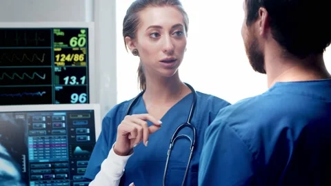 Professional medical doctors working in emergency medicine. The surgeon and the Stock Footage 141908769