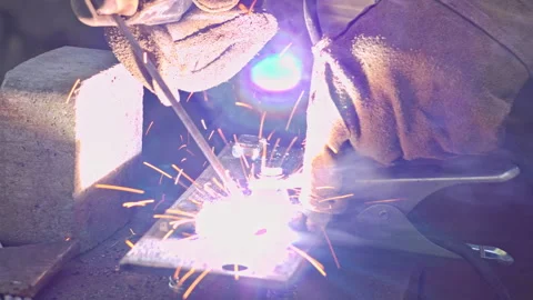 Professional Metal Welder Using Arc Welding Tools in Workshop Environment Stock Footage 337425079